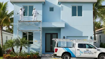Professional house painters working on exterior home painting in Fort Lauderdale FL