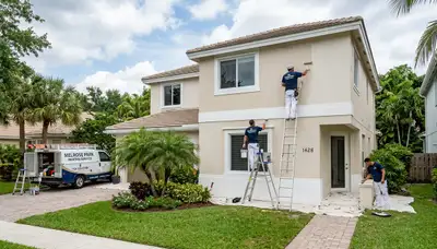 Professional house painters in Fort Lauderdale FL painting exterior home siding
